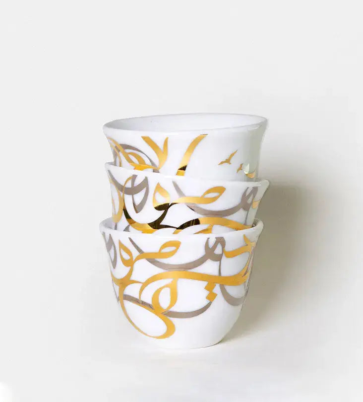 Contemporary gold and silver porcelain coffee cup finjal with Arabic graffiti print