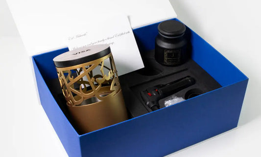 Luxury gift set containing personalised Arabic calligraphy incense burner with bakhur in premium branded gift box.