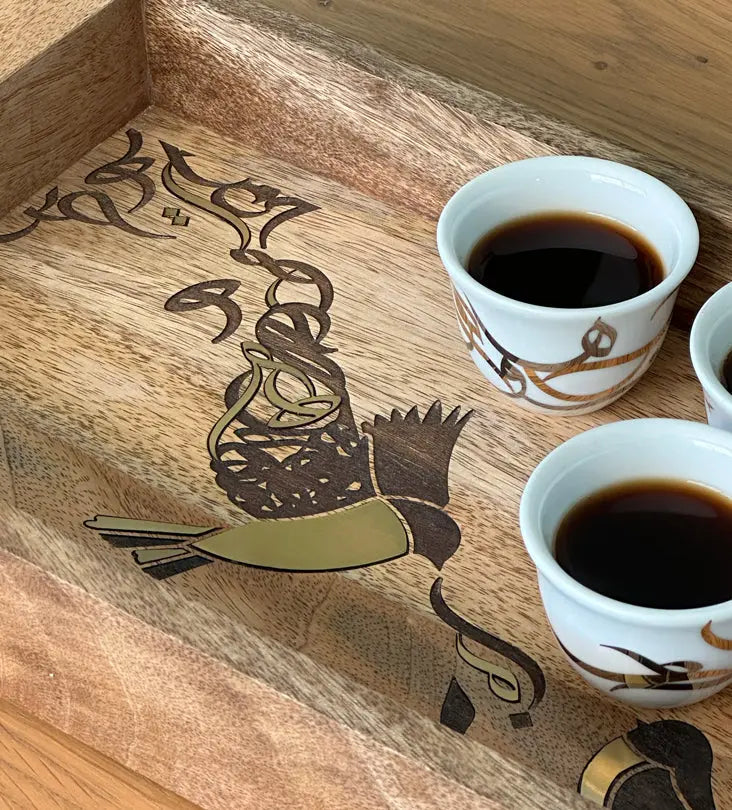 Beautiful tray featuring artwork of birds merged with Arabic calligraphy made with brass inlay and solid wood