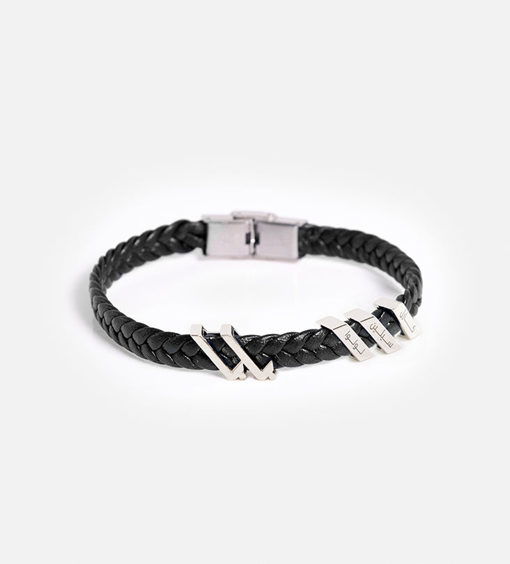 Custom made men's bracelet with polished sterling silver that reads baba, translating to father, in modern Arabic calligraphy.