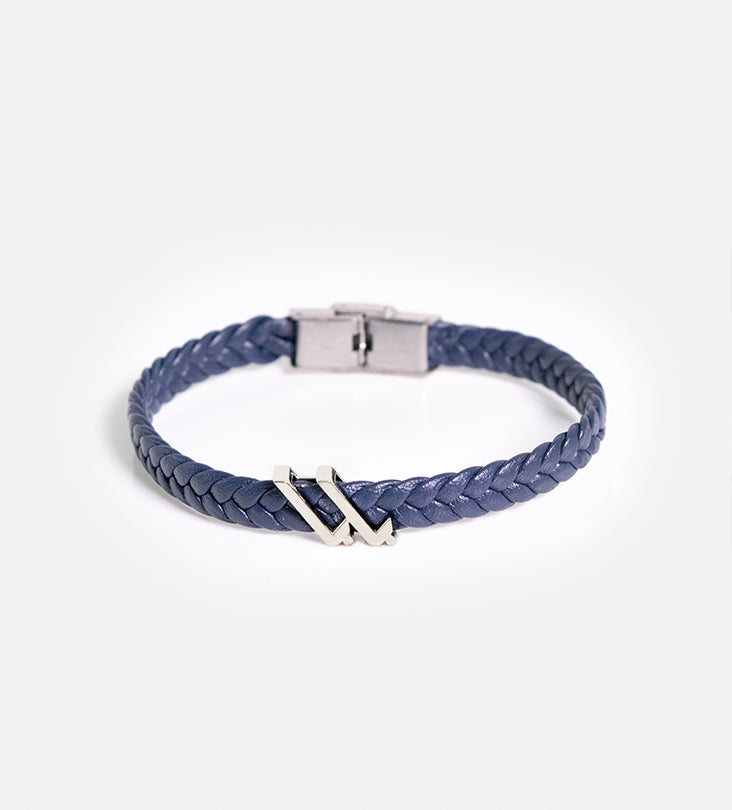 Custom made men's bracelet with polished sterling silver that reads baba, translating to father, in modern Arabic calligraphy.