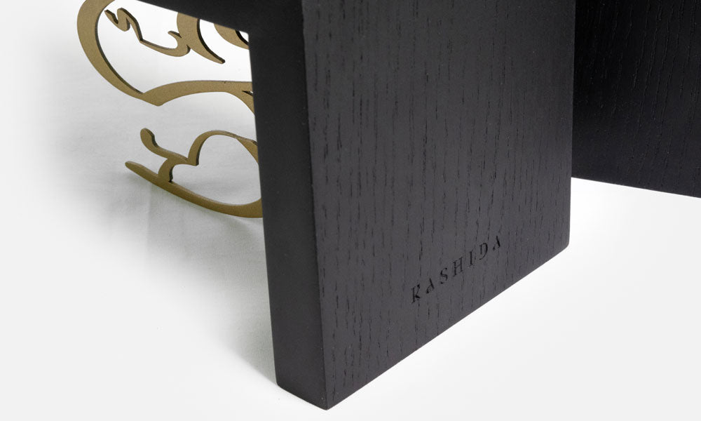 Pair of customized wooden and metal bookends designed by Kashida for Louvre Residences by Al Dar