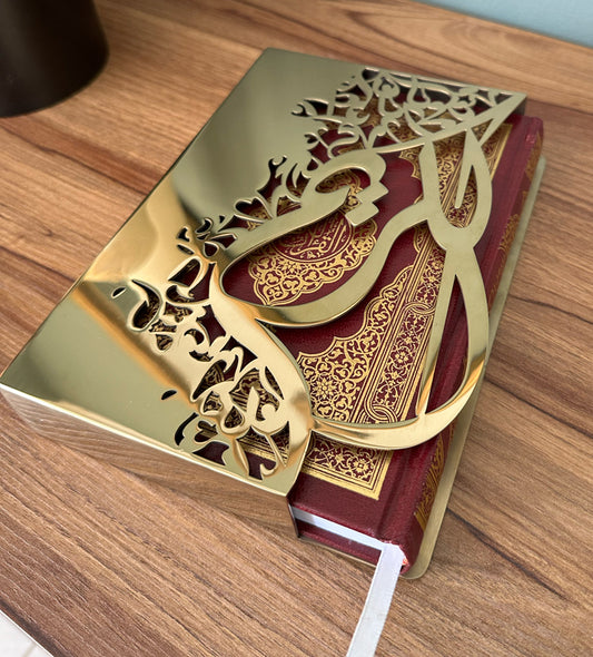 Gold sleeve for quran in Arabic calligraphy