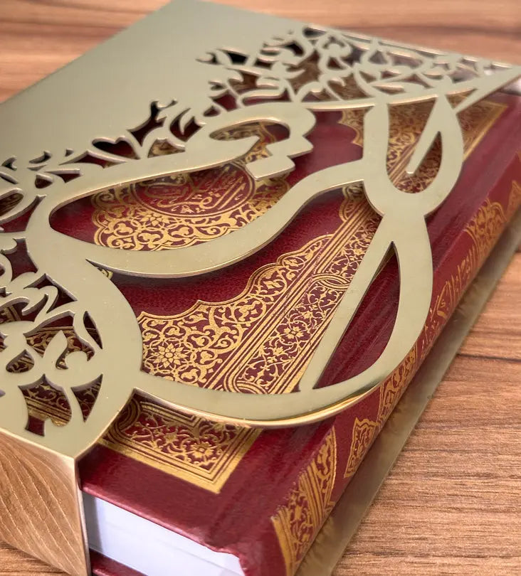 Gold sleeve for quran in Arabic calligraphy