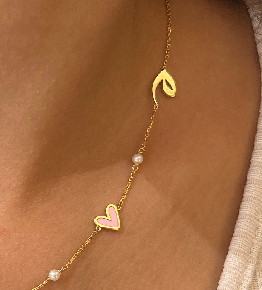 Custom made gold pendant earrings made with Arabic calligraphy letters