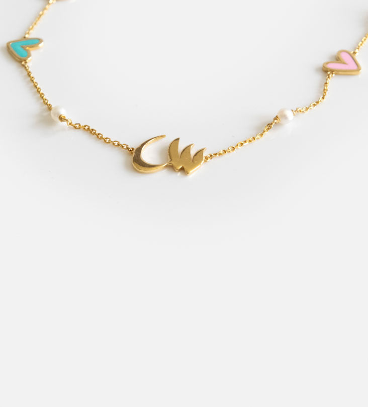 Custom made gold pendant earrings made with Arabic calligraphy letters