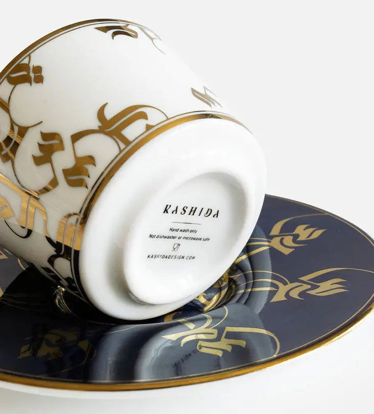 Elegant royal blue and gold espresso cup and saucer with Arabic calligraphy pattern print on porcelain