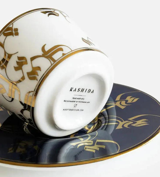 Elegant royal blue and gold espresso cup and saucer with Arabic calligraphy pattern print on porcelain