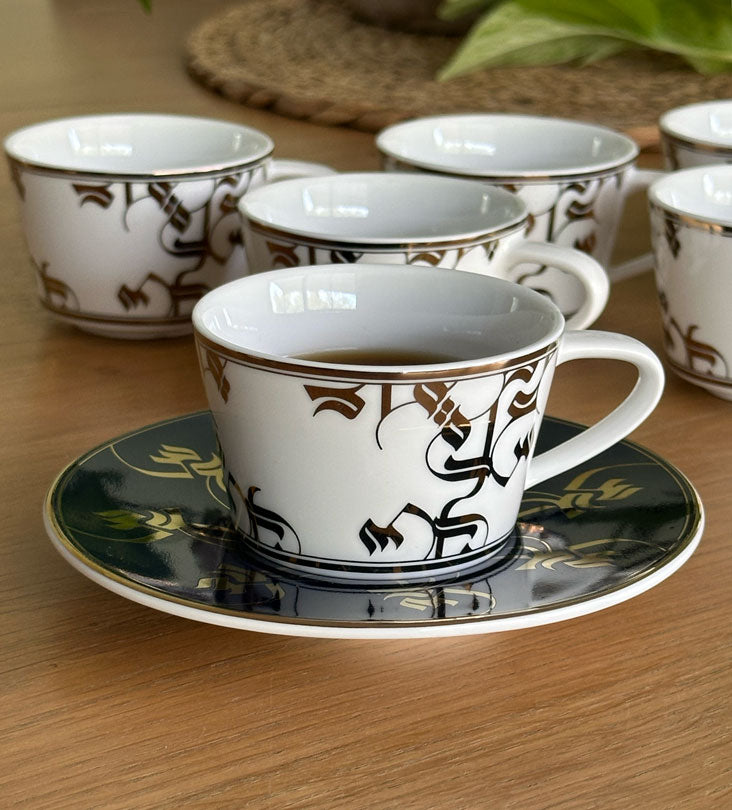 Elegant royal blue and gold espresso cup and saucer with Arabic calligraphy pattern print on porcelain