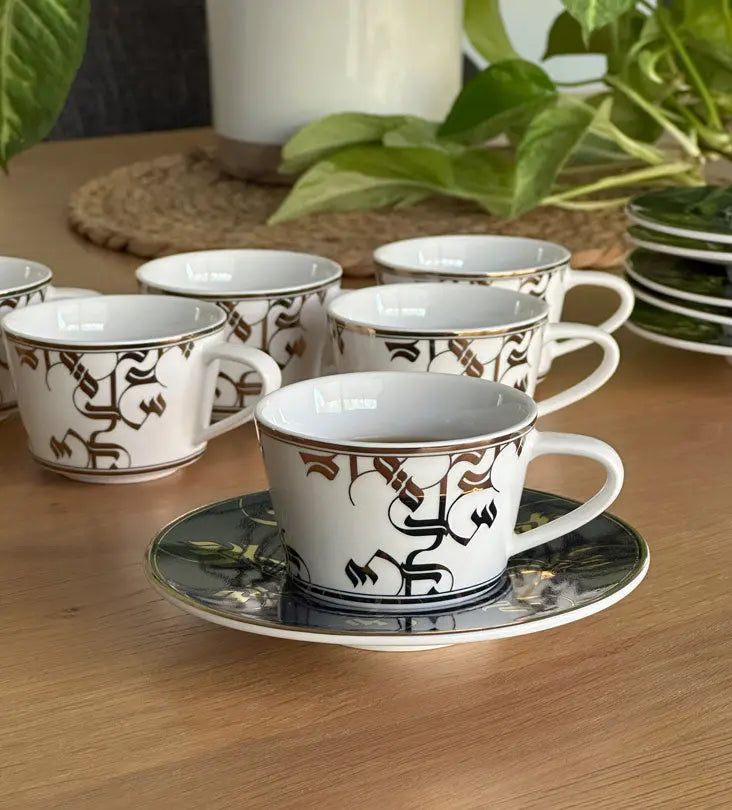 Elegant royal blue and gold espresso cup and saucer with Arabic calligraphy pattern print on porcelain