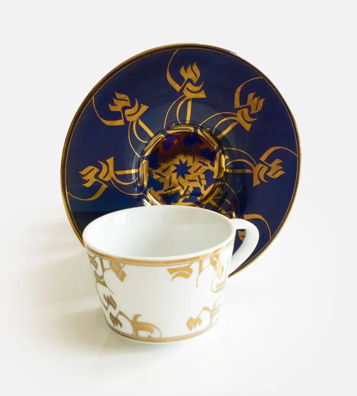 Elegant royal blue and gold espresso cup and saucer with Arabic calligraphy pattern print on porcelain