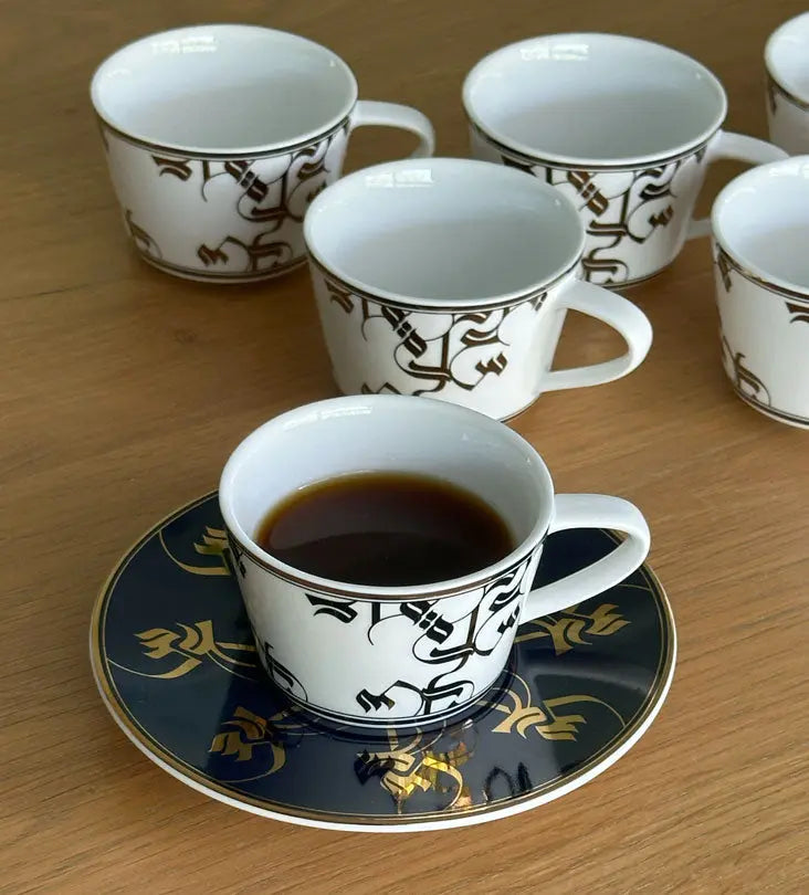 Elegant royal blue and gold espresso cup and saucer with Arabic calligraphy pattern print on porcelain