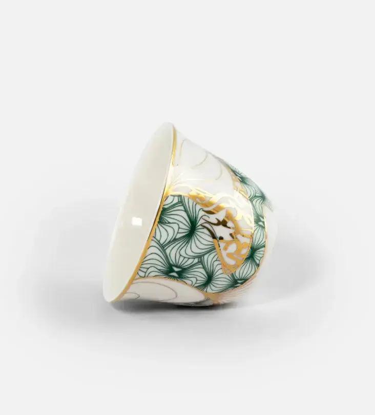 Porcelain Arabic coffee cup by Kashida in emerald green and gold hues