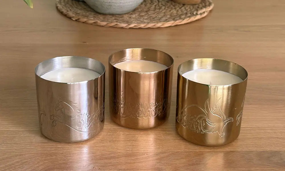 Hand-poured scented candles with fragrances that relate to the UAE in three beautiful metal canisters with Arabic calligraphy etchings featuring a poem by Sheikh Mohamad Bin Rashed Al Maktoum.