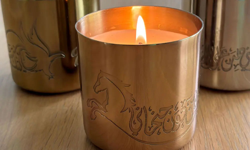 Hand-poured scented candles with fragrances that relate to the UAE in three beautiful metal canisters with Arabic calligraphy etchings featuring a poem by Sheikh Mohamad Bin Rashed Al Maktoum.