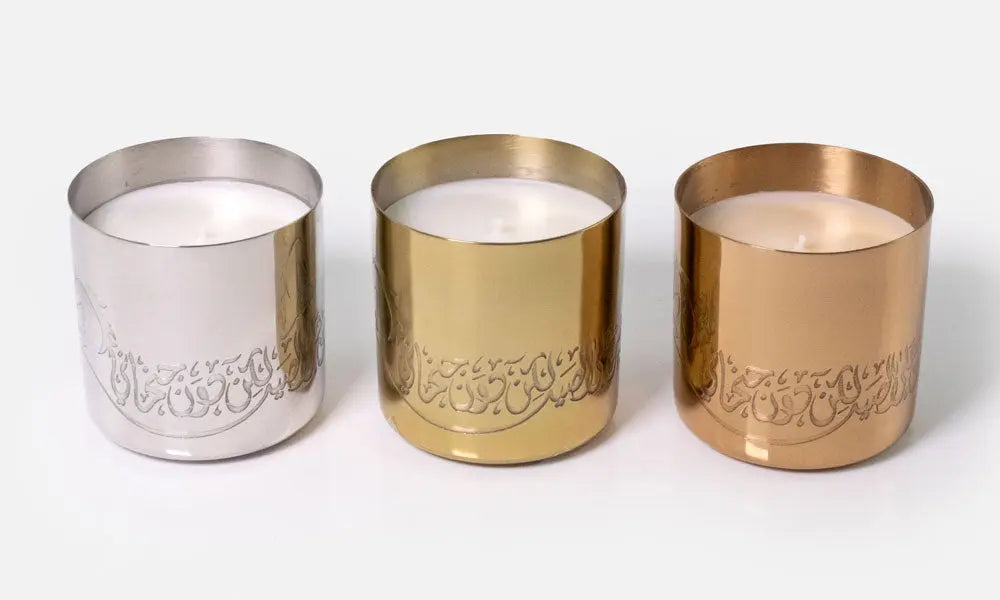 Hand-poured scented candles with fragrances that relate to the UAE in three beautiful metal canisters with Arabic calligraphy etchings featuring a poem by Sheikh Mohamad Bin Rashed Al Maktoum.