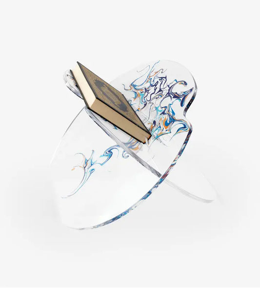 Transparent acrylic mushaf quran holder by Kashida featuring Arabic calligraphy
