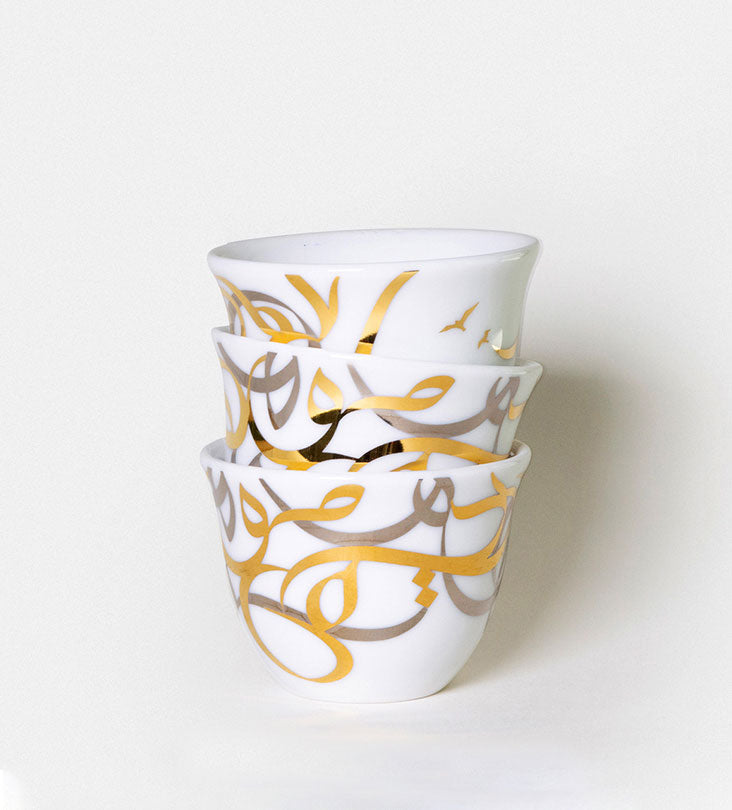 Contemporary gold and silver porcelain coffee cup finjal with Arabic graffiti print