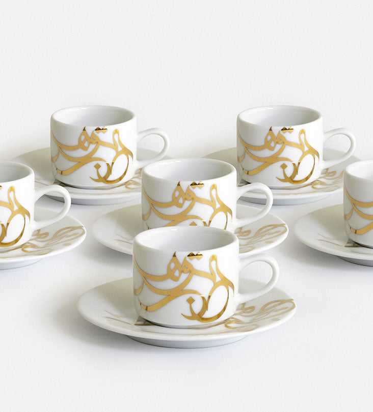 Contemporary gold and silver porcelain espresso cups with Arabic graffiti print