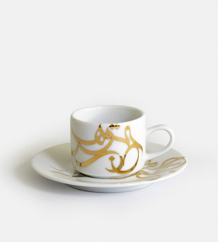 Contemporary gold and silver porcelain espresso cups with Arabic graffiti print