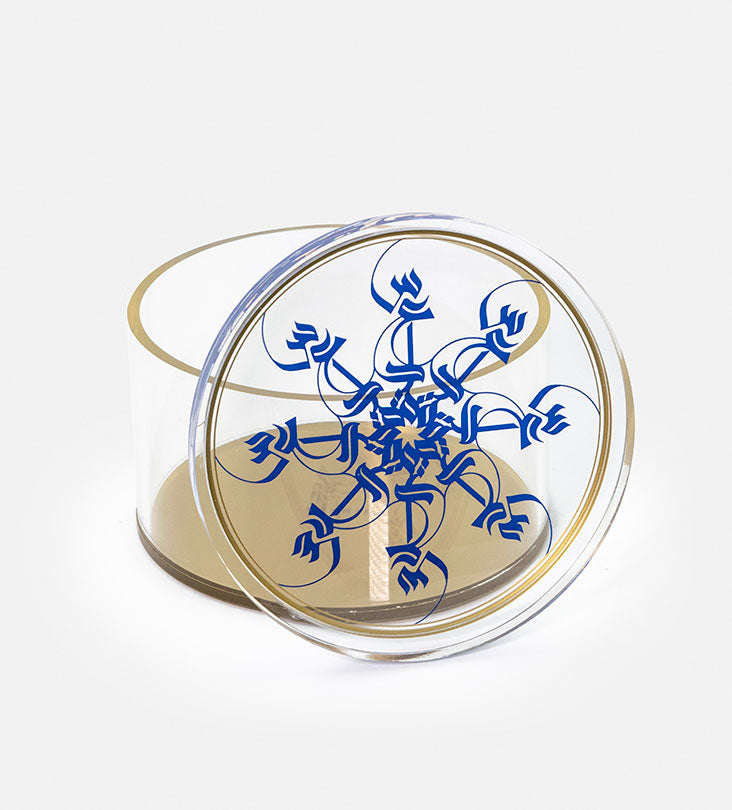 Medium Acrylic cylinder container in royal blue and gold with Arabic calligraphy pattern for storing sweets