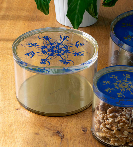 Medium Acrylic cylinder container in royal blue and gold with Arabic calligraphy pattern for storing sweets