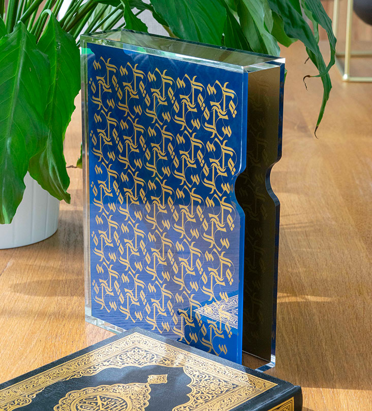 Acrylic holder for the holy quran featuring Arabic calligraphy pattern