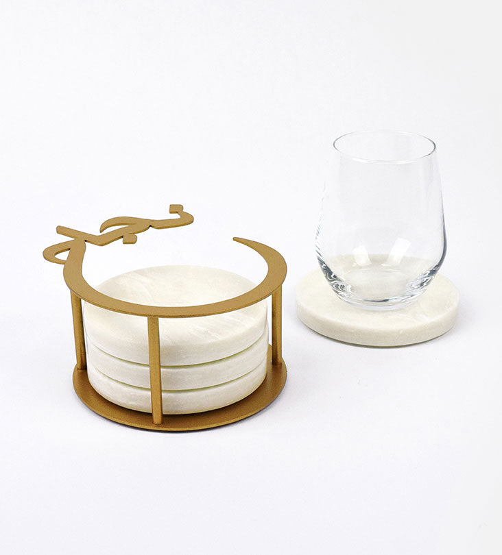 Set of four natural marble coasters in a steel holder decorated with Arabic calligraphy designed by Kashida