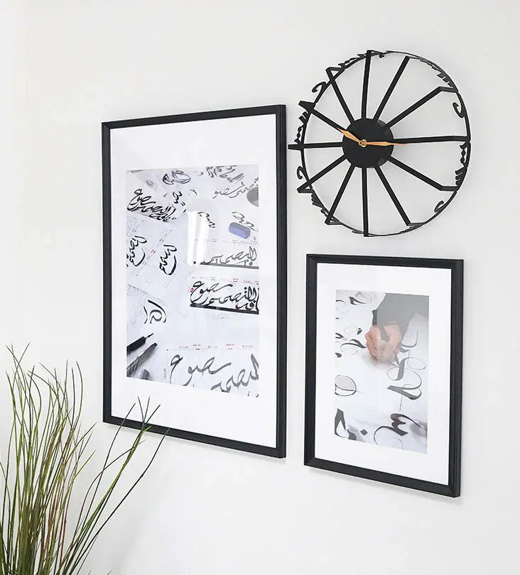 Modern contemporary metal wall clock with Arabic calligraphy