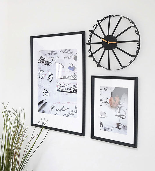 Modern contemporary metal wall clock with Arabic calligraphy
