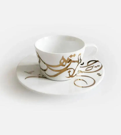 Contemporary gold and silver porcelain espresso cups with Arabic graffiti print