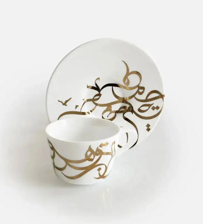 Contemporary gold and silver porcelain espresso cups with Arabic graffiti print