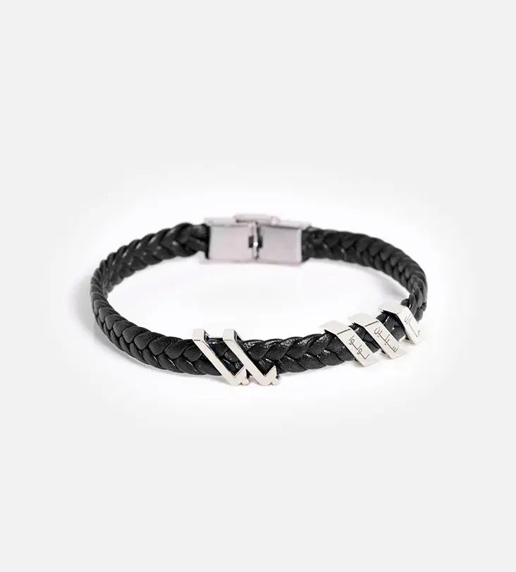 Custom made men's bracelet with polished sterling silver that reads baba, translating to father, in modern Arabic calligraphy.