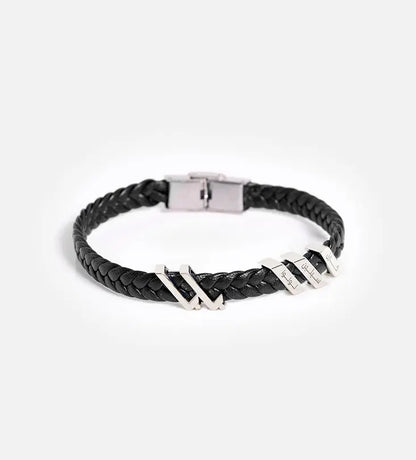 Custom made men's bracelet with polished sterling silver that reads baba, translating to father, in modern Arabic calligraphy.