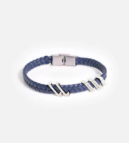 Custom made men's bracelet with polished sterling silver that reads baba, translating to father, in modern Arabic calligraphy.