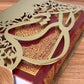 Gold sleeve for quran in Arabic calligraphy