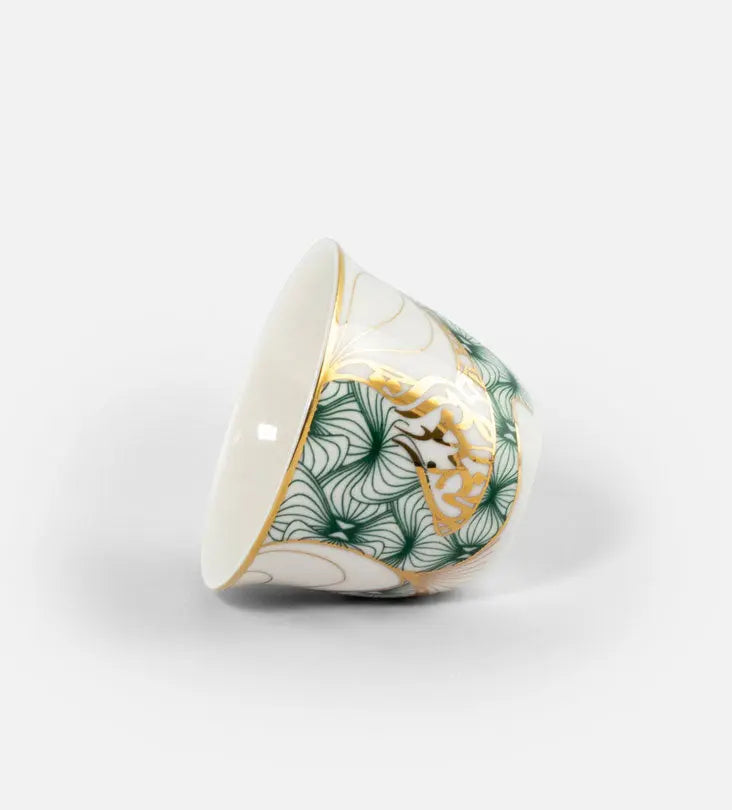 Porcelain Arabic coffee cup by Kashida in emerald green and gold hues