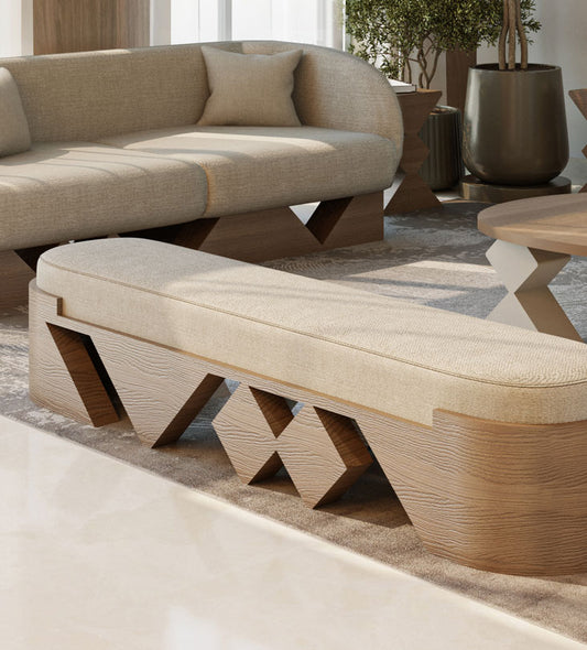 Modern wooden bench with rounded edges and neutral tone upholstery from Kashida's Nuqat collection.