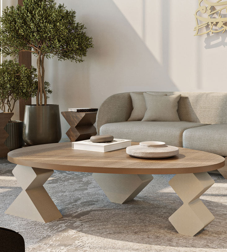 Modern and minimalist pebble-shaped wooden coffee table from Kashida design's latest collection, Nuqat.
