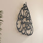 Tear drop shaped wall art in Arabic calligraphy with inspirational words