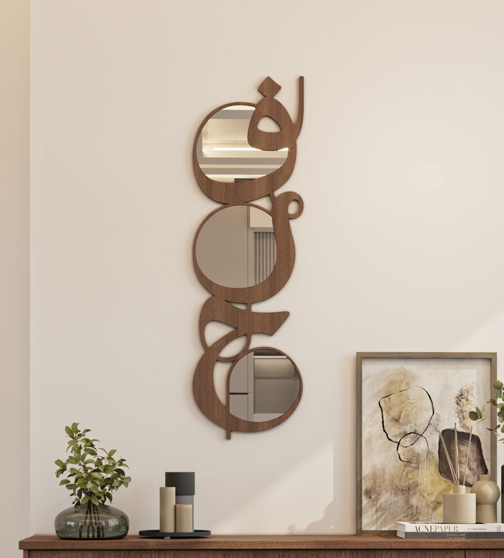 Modern contemporary wooden mirrors in Arabic calligraphy translating to joy