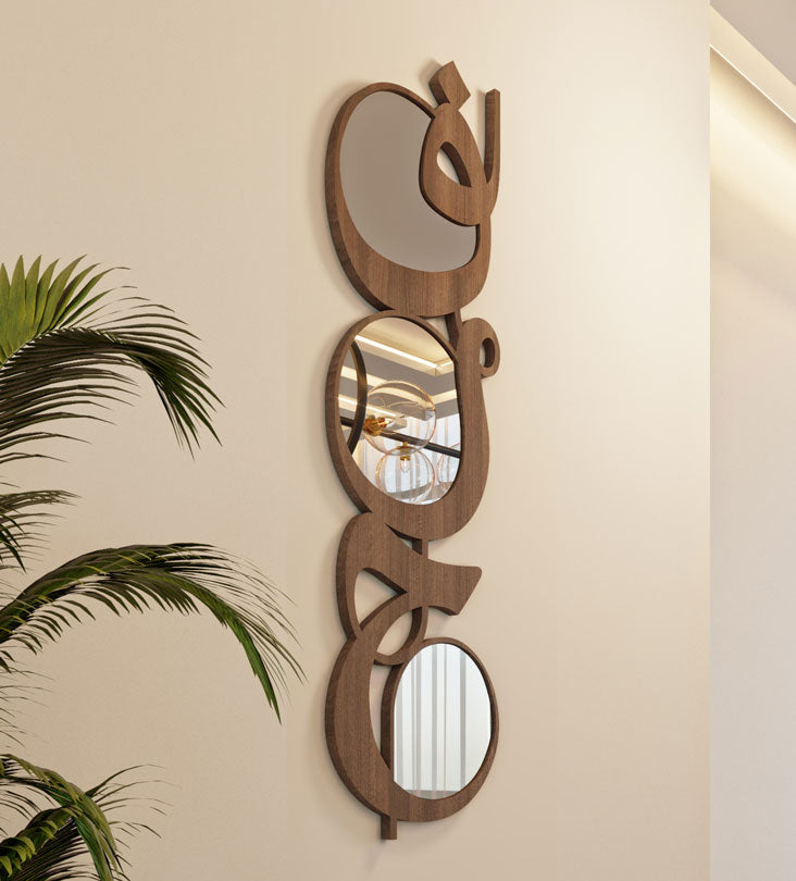 Modern contemporary wooden mirrors in Arabic calligraphy translating to joy