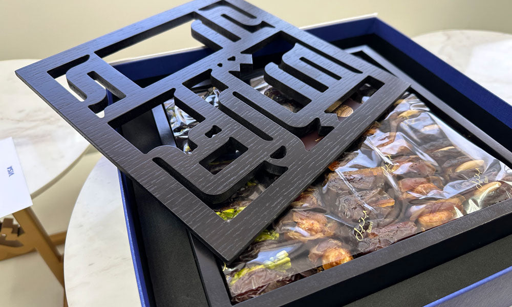 Elegant wooden box with Arabic calligraphy designed for Visa offices as corporate gifts for Ramadan Eid Al fitr