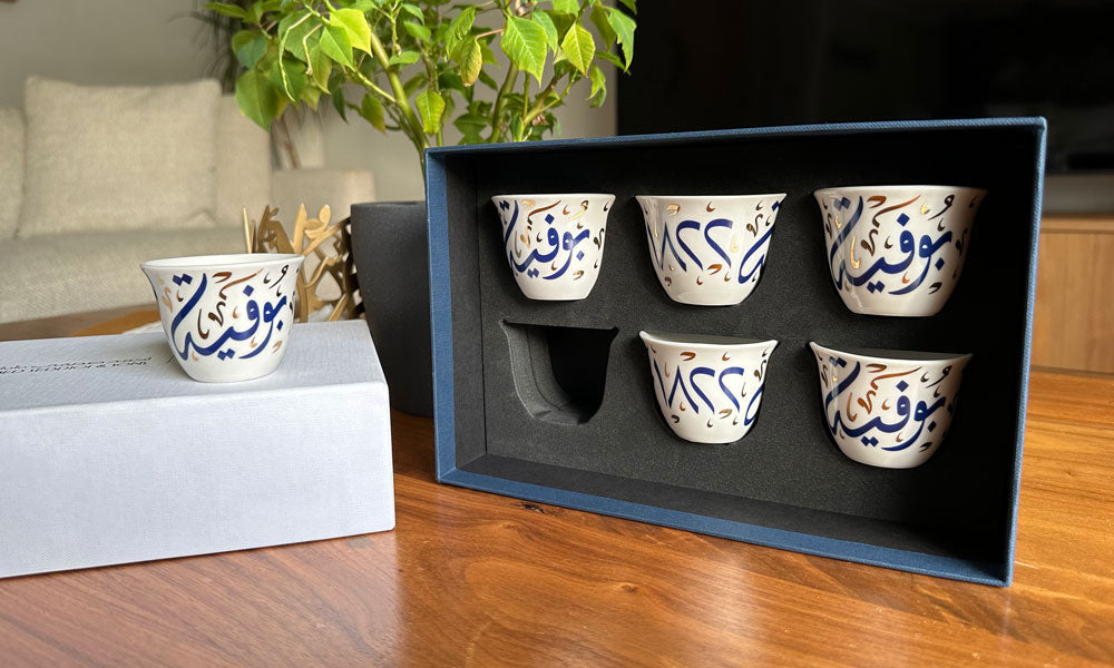 Custom made Arabic coffee cups in Arabic calligraphy designed as a corporate gift for Bovet timepieces