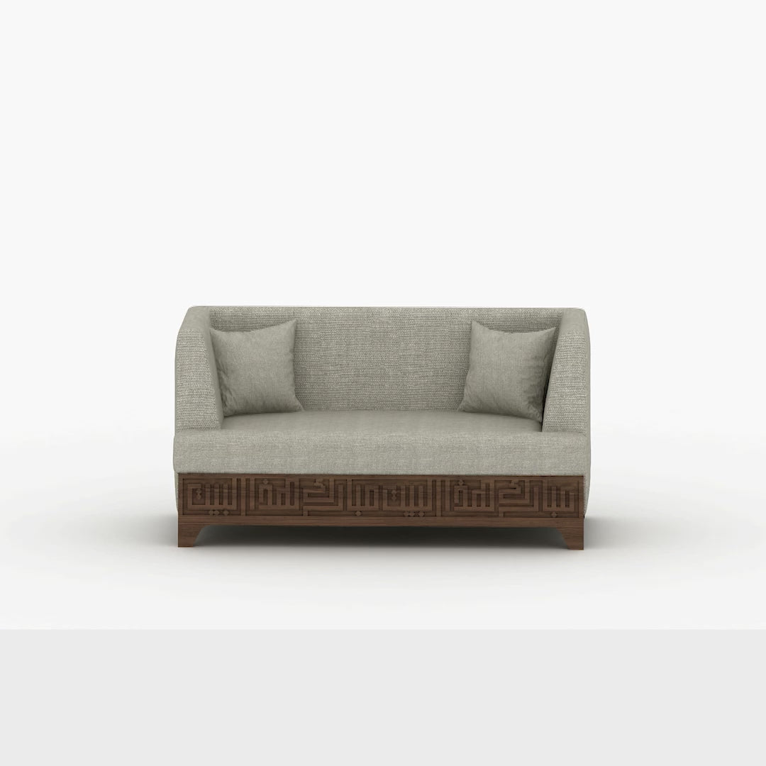 Beige upholstered 3 seater sofa featuring Arabic calligraphy carved woodwork from Kashida design