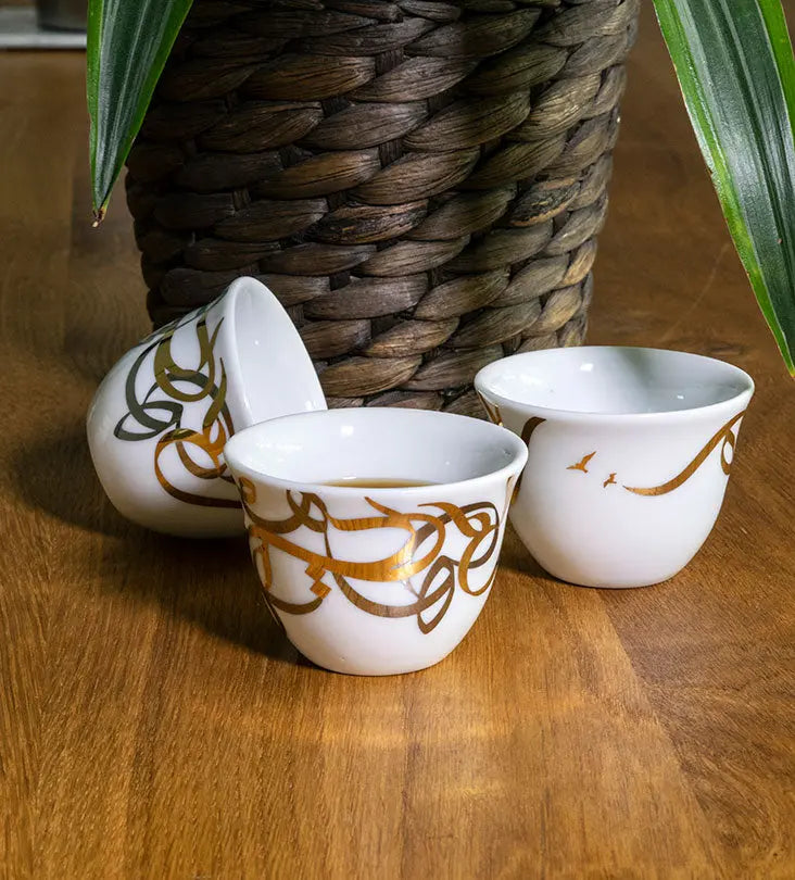 Contemporary gold and silver porcelain coffee cup finjal with Arabic graffiti print
