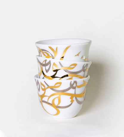 Contemporary gold and silver porcelain coffee cup finjal with Arabic graffiti print