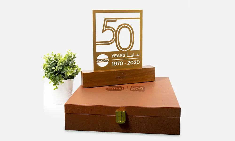 bunduq 50th anniversary trophy in elegant leather box designed by kashida