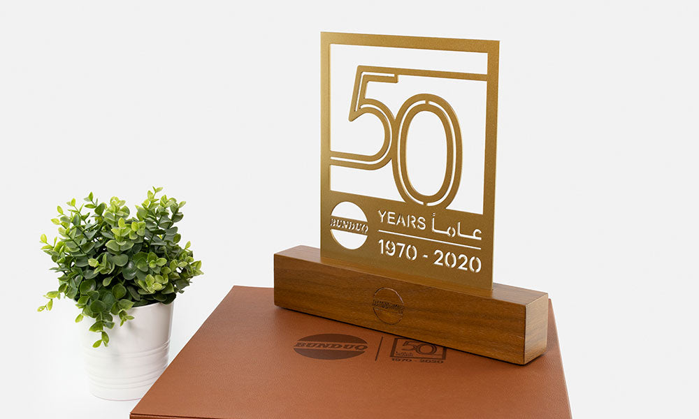 bunduq 50th anniversary trophy in elegant leather box designed by kashida