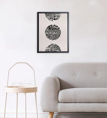 Three circles on top of each other in Arabic calligraphy printed on canvas